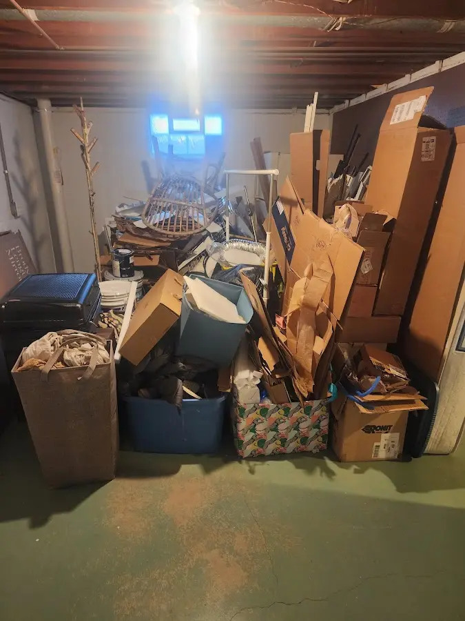 Roll-off dumpster container at job site for 15 Yard Dumpster Rental in Biloxi